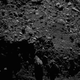 A view of the Nut and Serquet regions on the comet’s smaller lobe, taken from a distance of 1.3 miles (2.1 km).